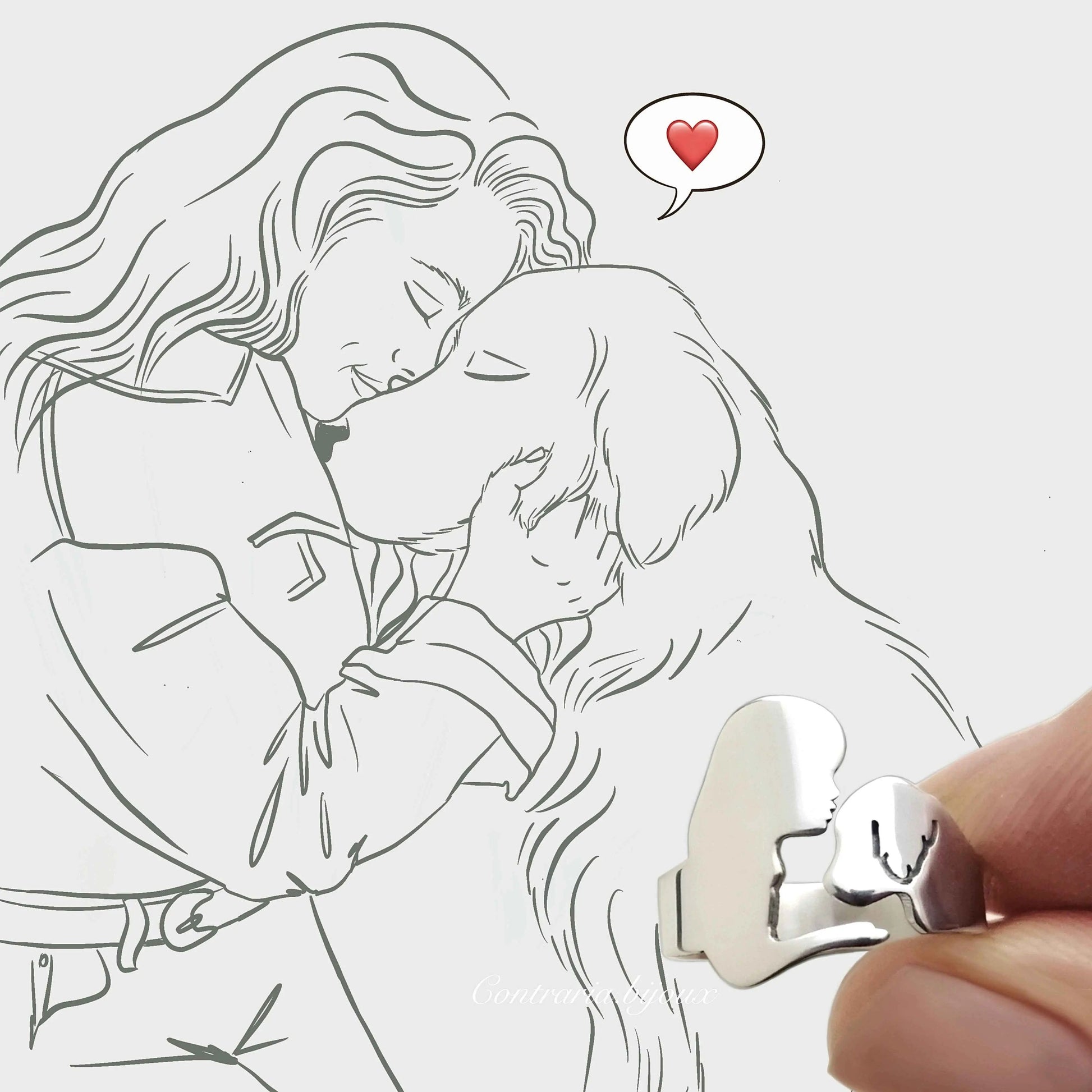 Anello che raffigura la sagoma di una ragazza di profilo che accarezza il muso di un cane Golden retriever di profilo