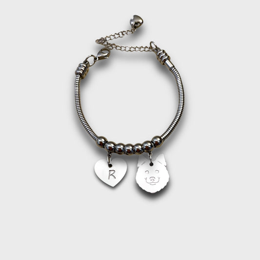 Bracciale cane Volpino di Pomerania e zampa con iniziale incisa, cane Pomerania ciondolo, bracciale pomerania - ContrariaBijoux