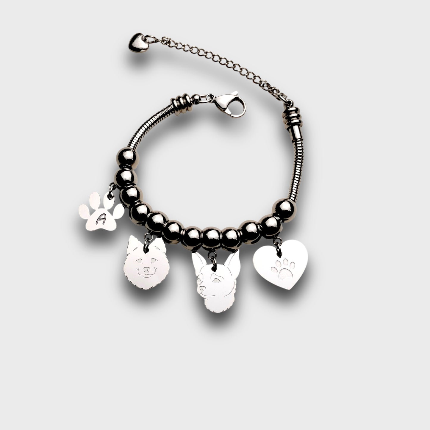 Bracciale cane Volpino di Pomerania e zampa con iniziale incisa, cane Pomerania ciondolo, bracciale pomerania - ContrariaBijoux