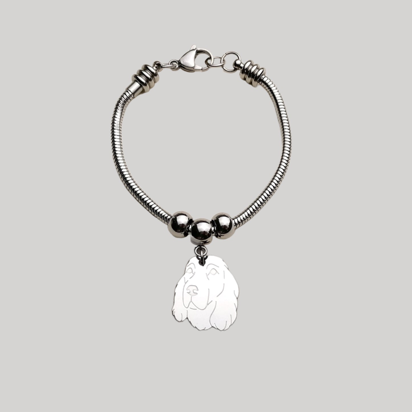 Bracciale cane Cocker e zampa con iniziale incisa