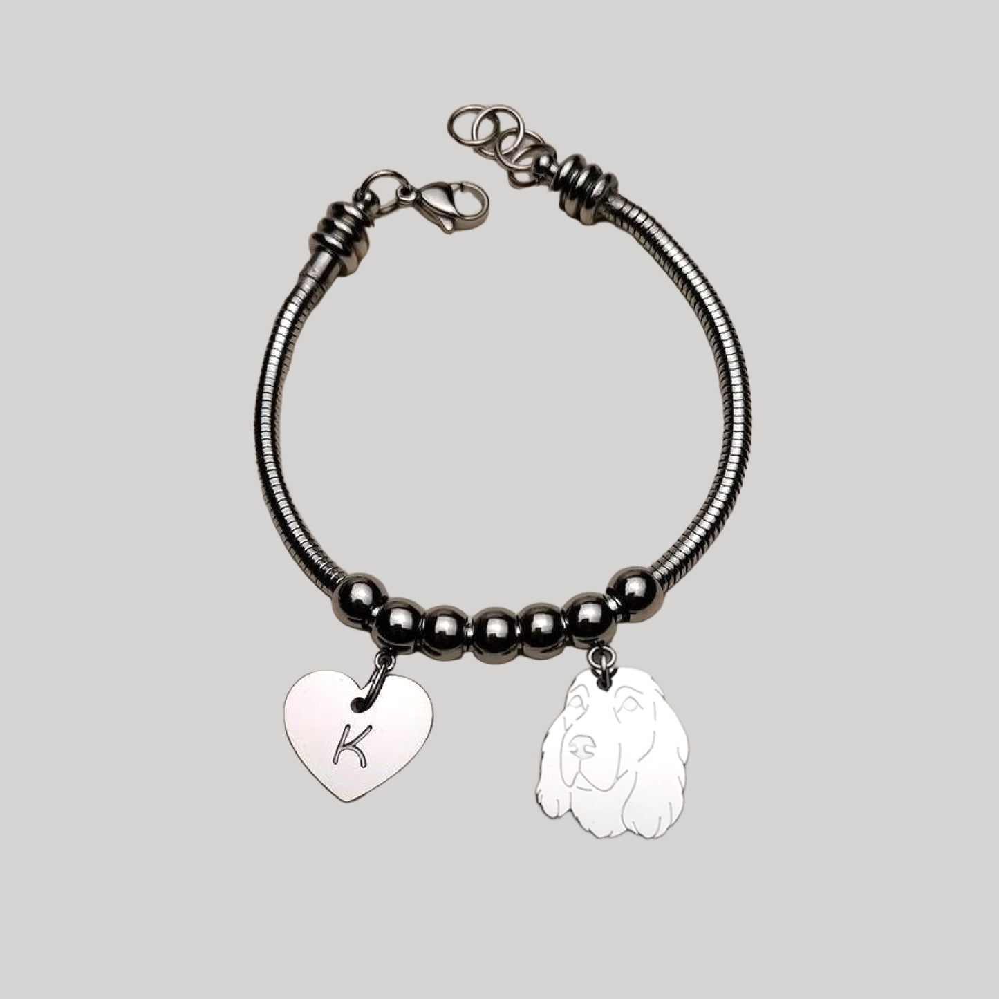 Bracciale cane Cocker e zampa con iniziale incisa