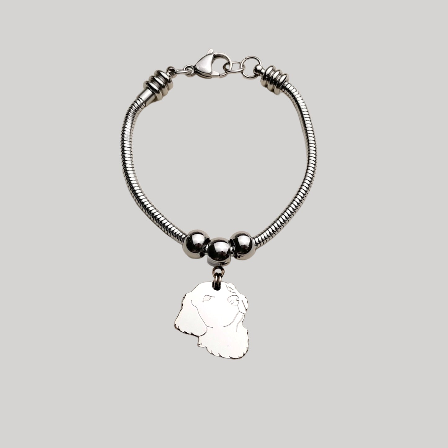 Bracciale cane Golden Retriever e zampa con lettera incisa
