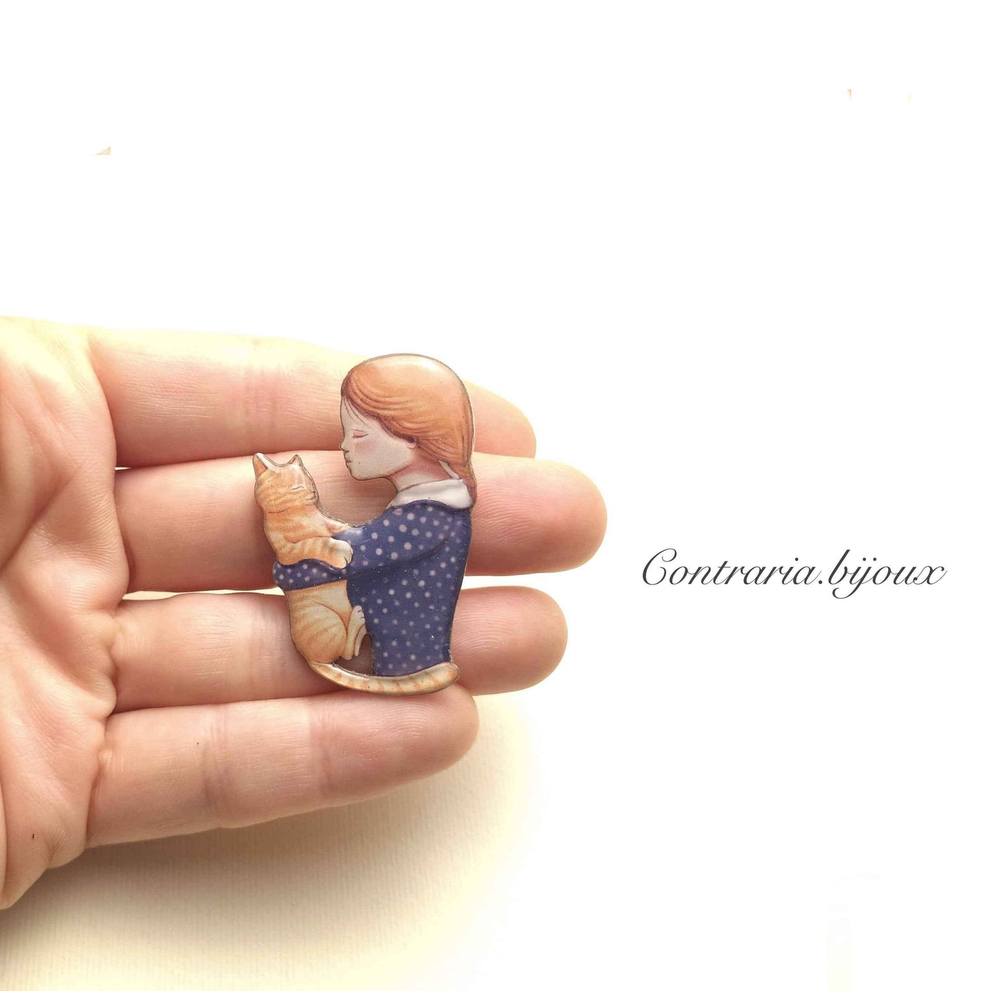 Spilla gatto rosso e ragazza