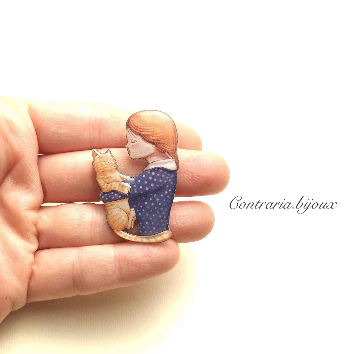 Spilla gatto rosso e ragazza