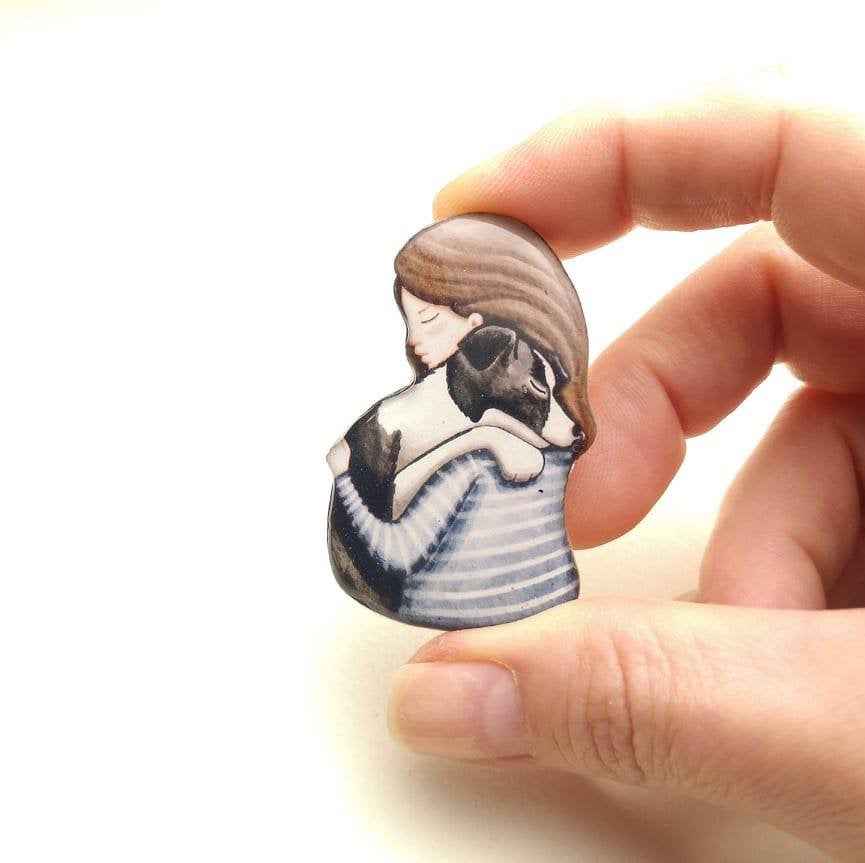 Spilla ragazza e border collie