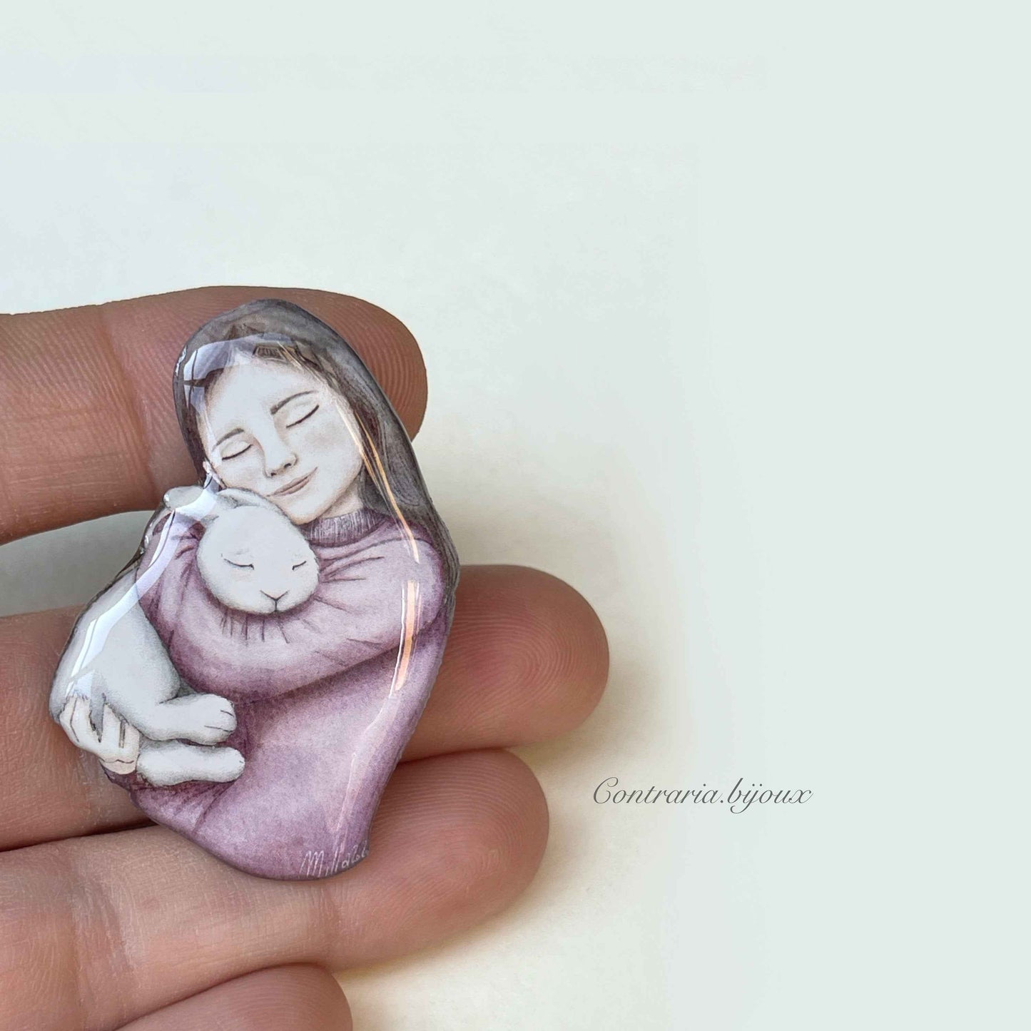 Spilla ragazza e coniglio